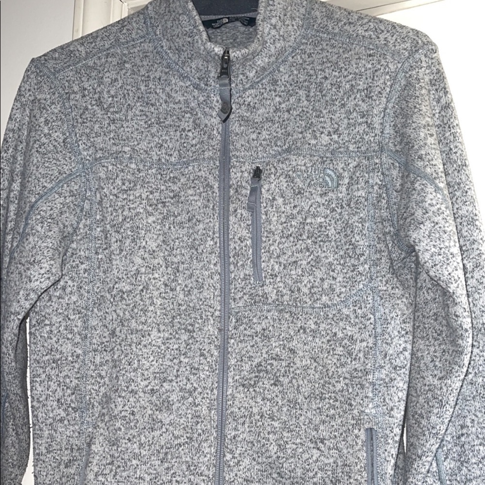 The North Face zip up jacket! Size: Youth Large boys/girls